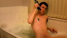 Horny lad taking hot bath and masturbating