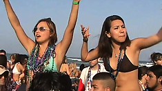 Smoking hot Latinas at a wild beach party show off their knockers